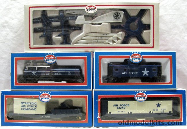 Model Power HO US Air Force Train Set - Five Models - 40' Tank Car - Wide Vision Caboose - Spotlight Car with Working Light - Hidden Gun Box Car with Dropping Sides and Howitzers - Missile Launcher with Four Missiles and Four Aircraft - HO Scale plastic model kit